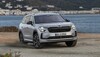 Vista delantera del Skoda Kodiaq híbrido, destacando su robustez y diseño moderno. Vista delantera del Skoda Kodiaq híbrido, destacando su robustez y diseño moderno.