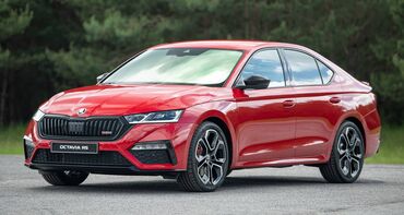 Perfil delantero y lateral del Skoda Octavia RS destacando su diseño deportivo. Perfil delantero y lateral del Skoda Octavia RS destacando su diseño deportivo.
