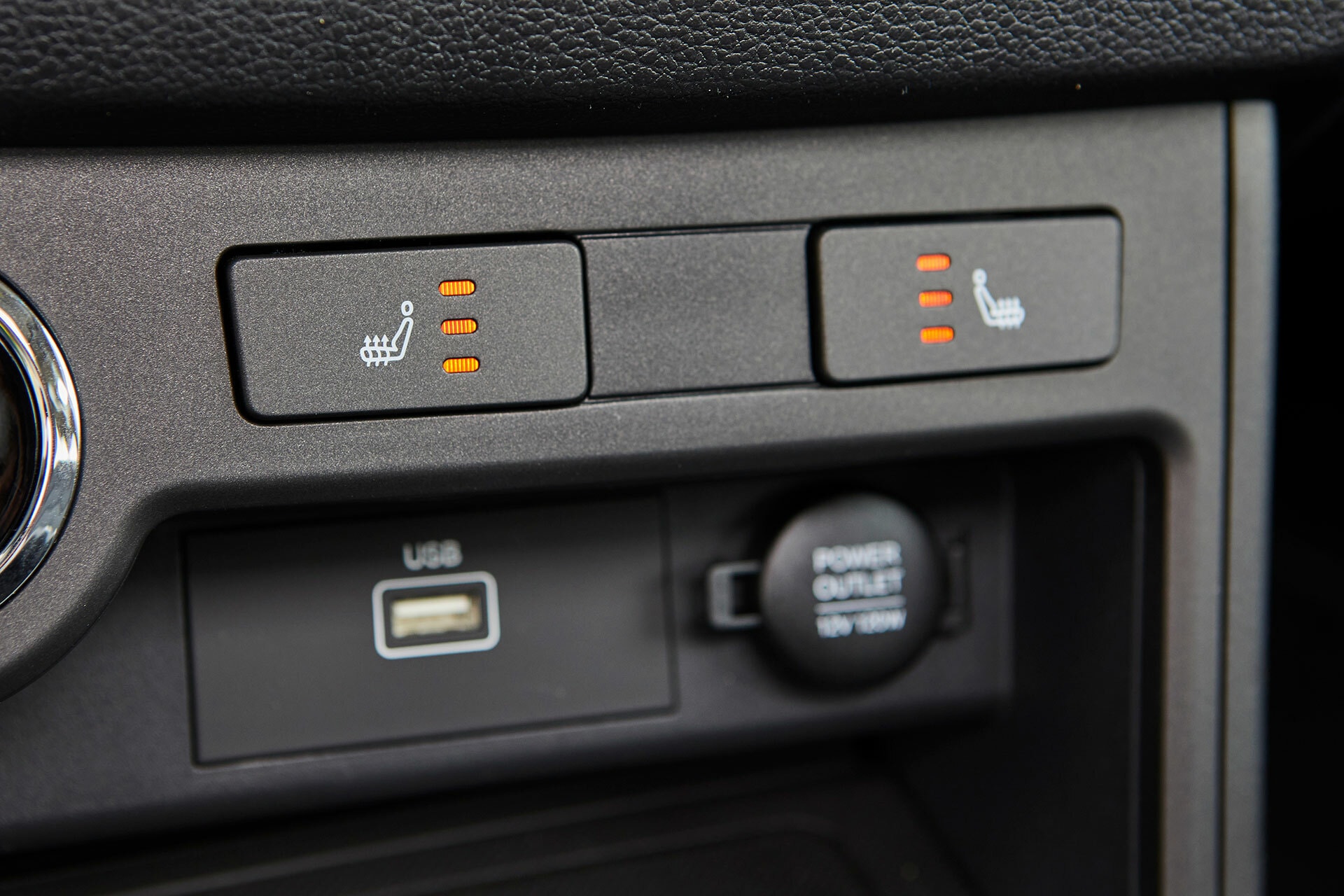 Controles para la calefacción de los asientos delanteros.