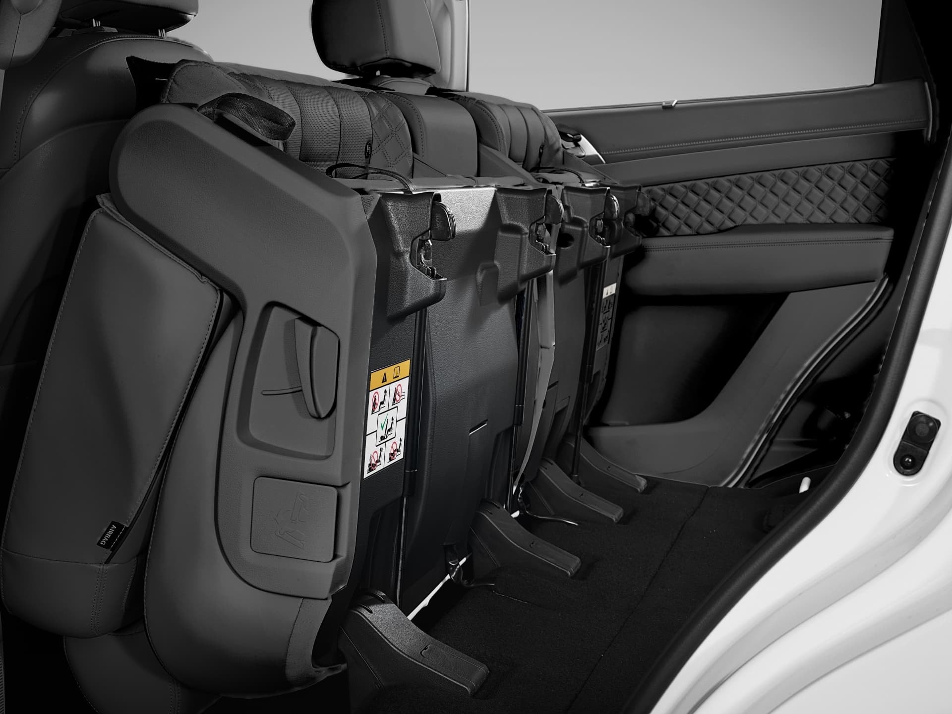 Espacio de carga versátil con asientos abatibles en Rexton.