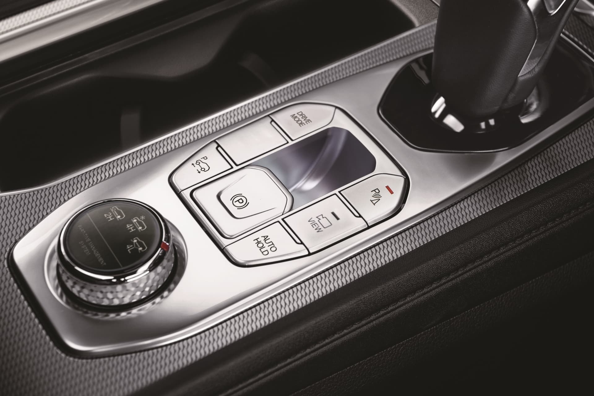 Selector de modos de conducción y controles de tracción del Rexton.