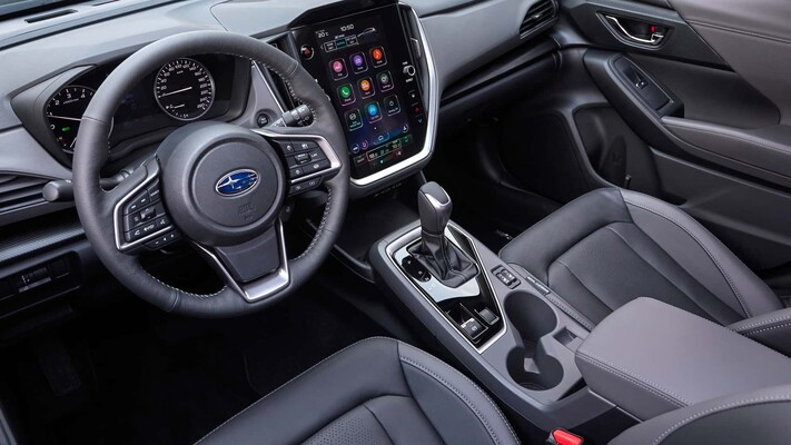 Vista moderna del interior del Subaru Crosstrek, destacando su consola central. Vista moderna del interior del Subaru Crosstrek, destacando su consola central.