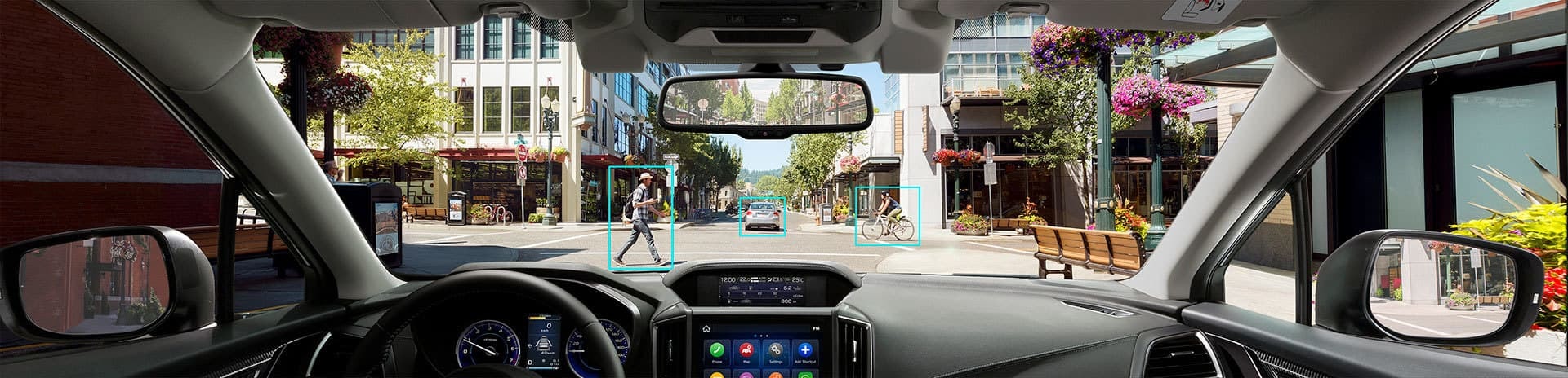 Panel de instrumentos y controles desde la perspectiva del conductor.