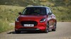 Vista frontal del Suzuki Swift, destacando su parrilla y faros Vista frontal del Suzuki Swift, destacando su parrilla y faros