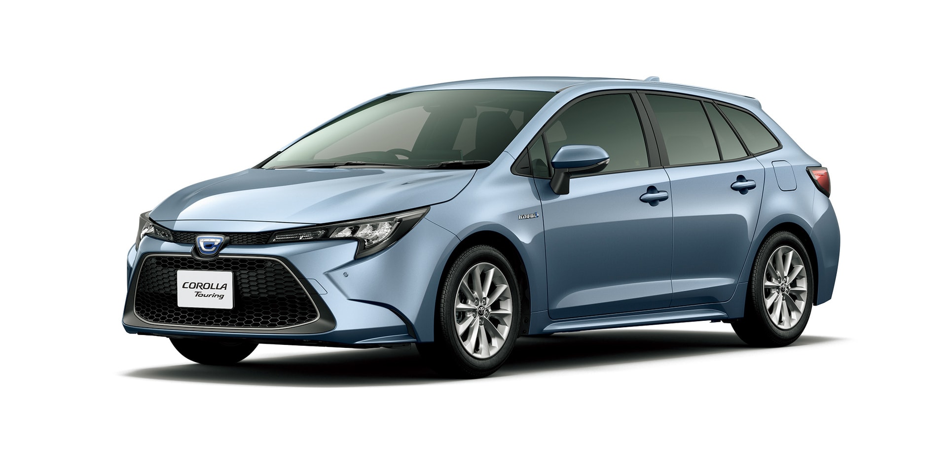 Perfil lateral del Toyota Corolla Touring Sports Híbrido en gris metálico.