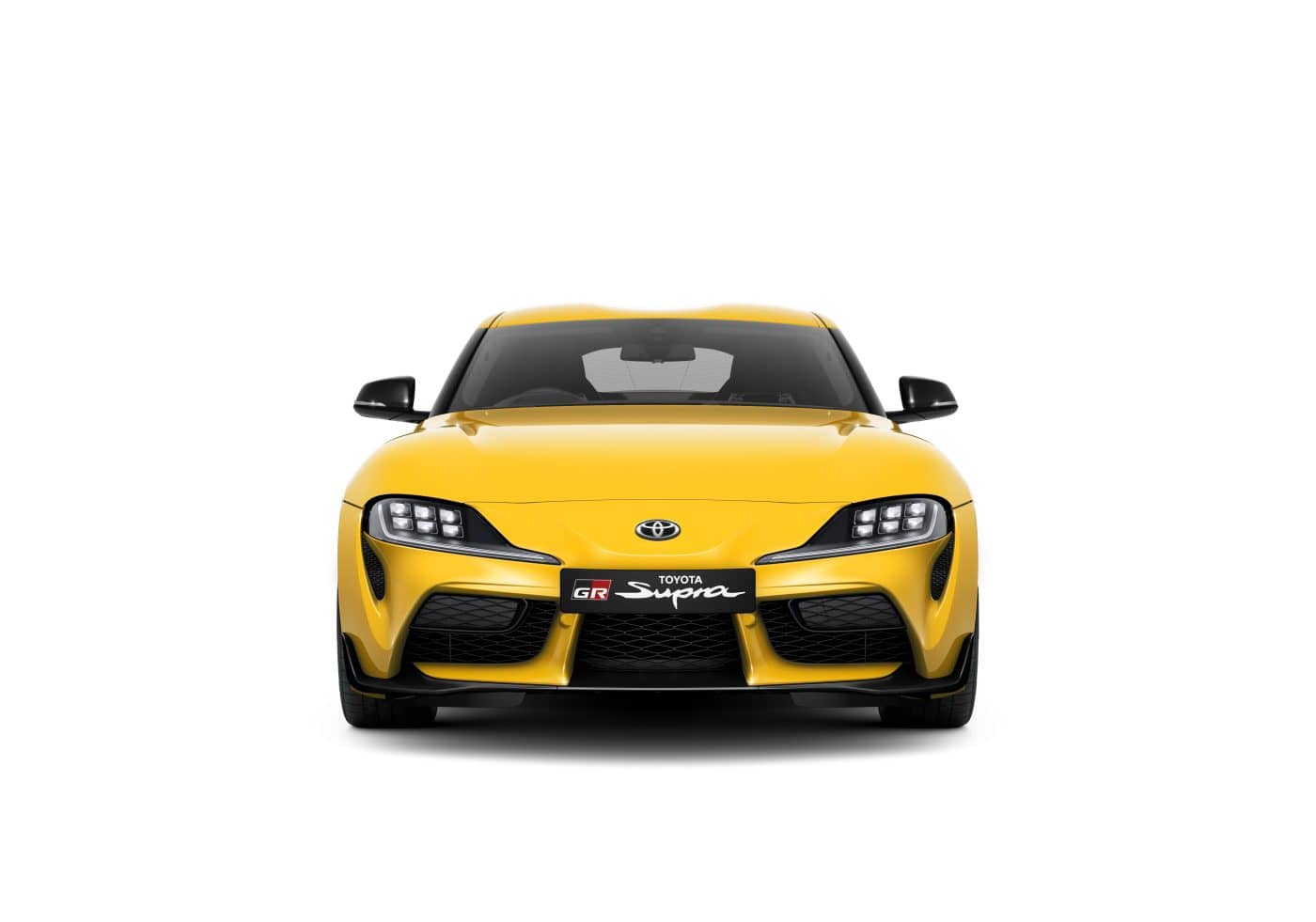 Vista de frente del Toyota GR Supra, enfatizando su agresiva parrilla y faros LED.