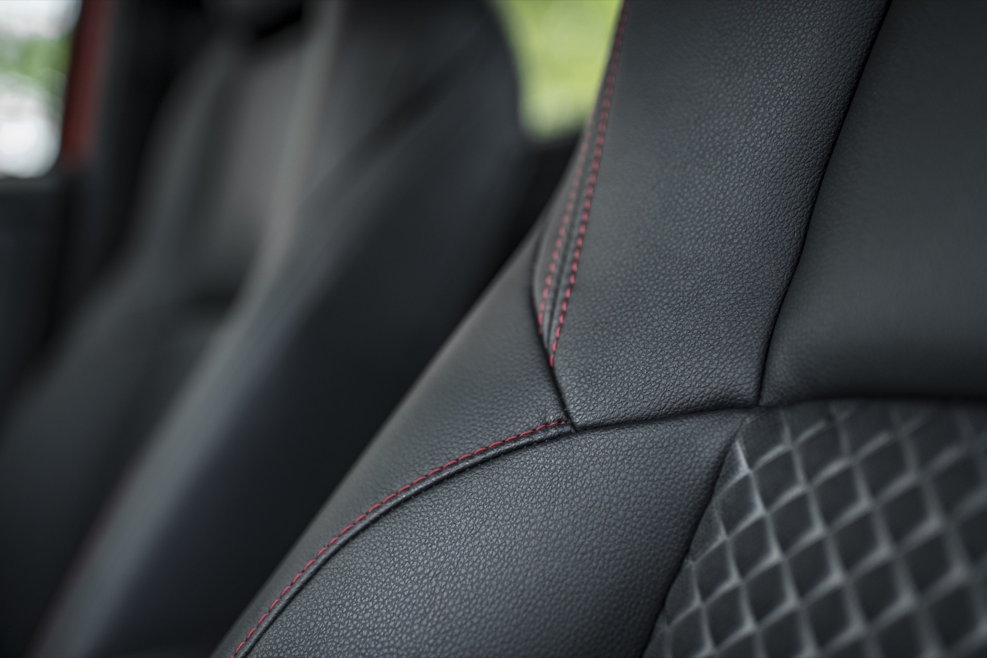 Detalle lateral del asiento de tela del Toyota Yaris