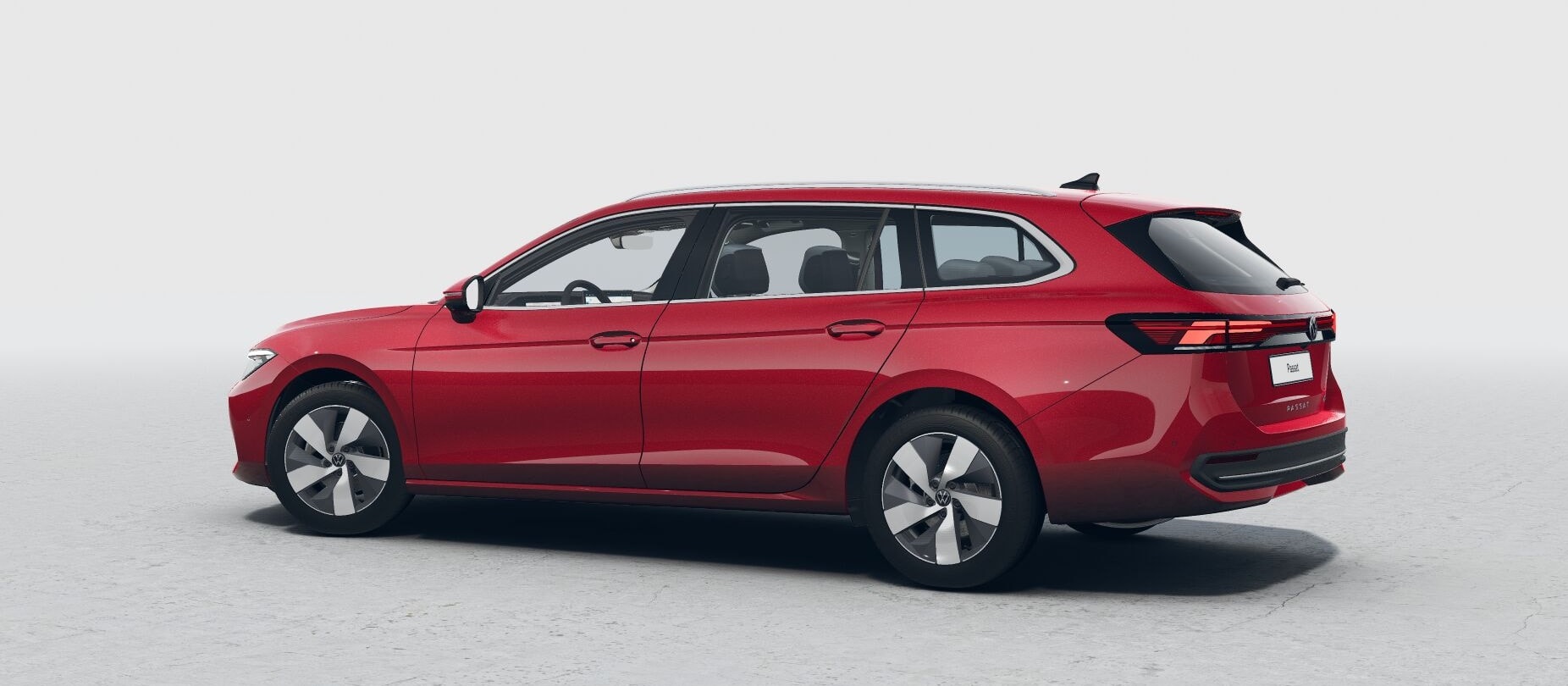 Perfil lateral y trasero del Volkswagen Passat Variant en rojo.