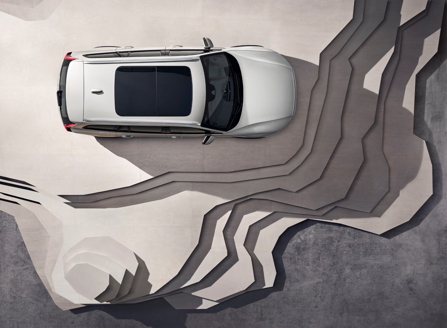 Vista superior del V60 Cross Country, destacando su techo panorámico y líneas.