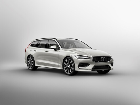 Vista lateral del Volvo V60 Híbrido enfatizando su diseño aerodinámico. Vista lateral del Volvo V60 Híbrido enfatizando su diseño aerodinámico.