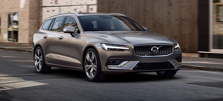 Elegante Volvo V60 en movimiento, combinando estilo y funcionalidad. Elegante Volvo V60 en movimiento, combinando estilo y funcionalidad.