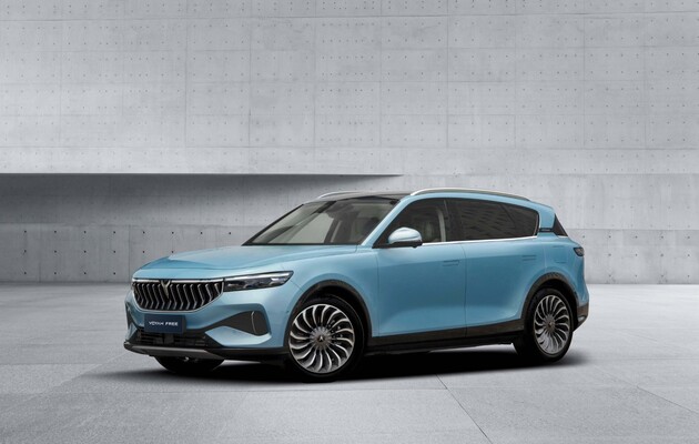 Ángulo que combina la vista lateral y delantera del Voyah Free. Ángulo que combina la vista lateral y delantera del Voyah Free.